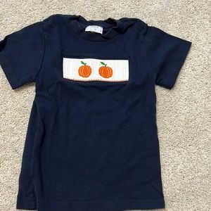 Boys smocked pumpkin shirt by Stellybelly